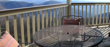 Enjoy an outdoor dinner on the deck, with Crawford's Knob in the background.