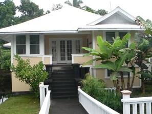 Front of house, cross the bridge to get to home. 