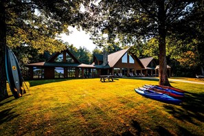 Enjoy the expansive lawn and lake access for endless outdoor adventures.