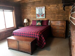 Spacious lakeside master bedroom