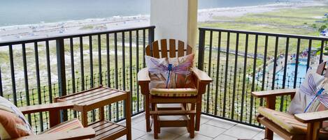 Come sit on our beachfront balcony and rock in our a
dirondacks!!...