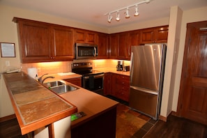 Modern updated kitchen with stainless-steel appliances