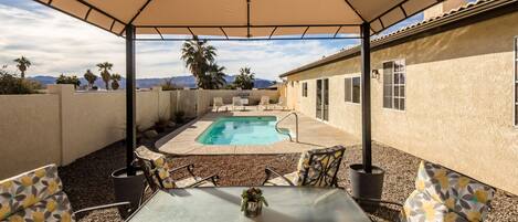 Sit under a canopy during the day or night
Table for 6 people