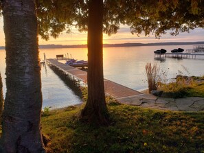 The flagstone pathway leads directly to the 90 ft. dock with solar lights. 