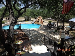 Large sitting area around pool