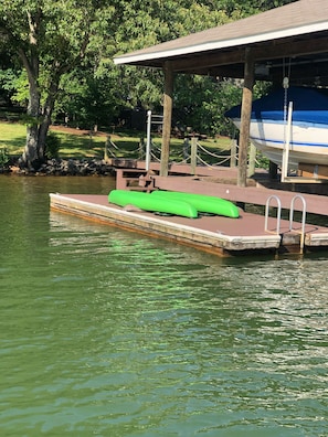 Floating dock with cleats to tie up boat.