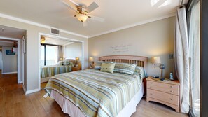 Master bedroom with king bed & balcony access overlooking the ocean