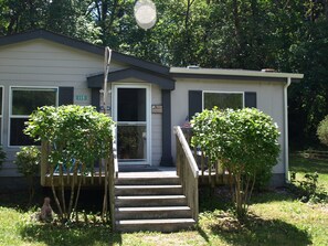 Front and rear glass screened storm doors allows fresh air to flow throughout.