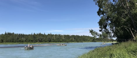 Boats passing by on the Kasilof River