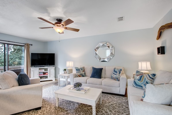 Beautifully Decorated Living Area with Large Sectional and Flat Screen TV (Smart TV with Apple TV device)