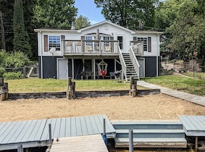 Lake side view of house with small beach for the kids (back)