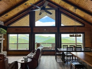 Open Area. Living room, dining and kitchen with panoramic view.