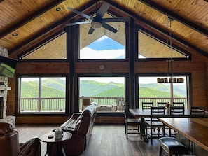 Open Area. Living room, dining and kitchen with panoramic view.