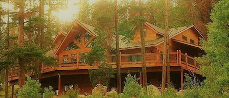 Nestled in the woods with huge wraparound deck!