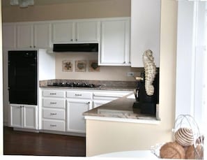 Large, fully stocked kitchen. Toddler eating chair available.