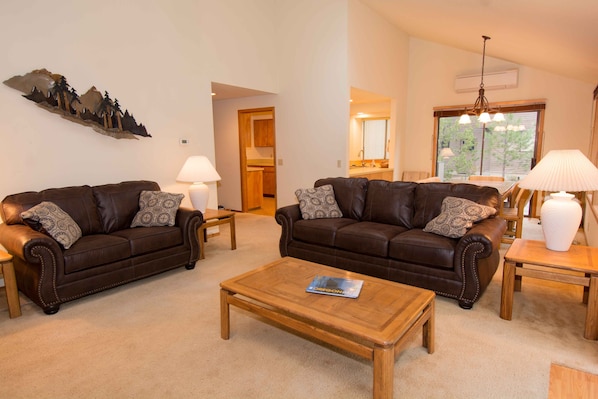 Bright Family Room with new couches 
