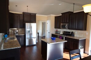 modern kitchen with espresso machine & more