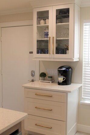 Coffee bar and beverage center with Keurig coffee maker and "wine down" glasses!