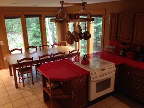 Kitchen and dining area viewed from the stairs