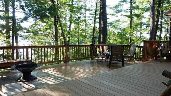 The huge, 2-tiered deck faces west to the lake and the sunset. 