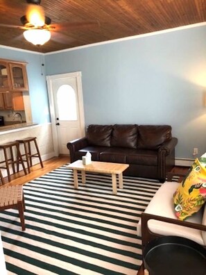 Living room and breakfast bar.