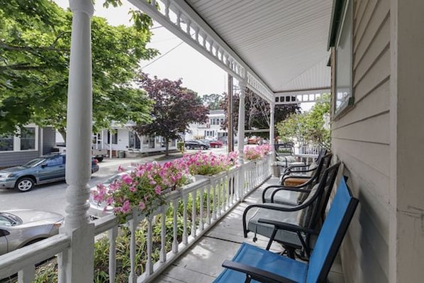 The front porch, beachside, steps to the ocean