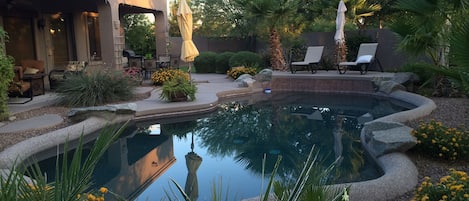  Relax in our backyard oasis with a lounging pool, tanning deck and seating.
