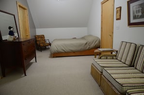 Upstairs bedroom with sitting area