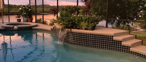 Heated Pool and Jacuzzi both have refreshing water fall features.