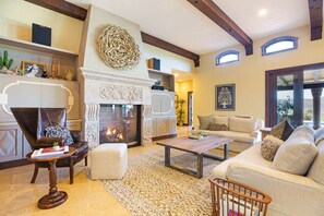 Great Room living area with fireplace, smart TV, Sonos