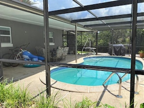 Cool off and relax in our screened in private use pool