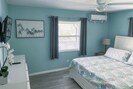 Sleep sound in our main bedroom overlooking the freshwater canal with king bed