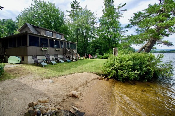 "Leaning Pines"  main house at the waters edge. Gradual sandy beach. 