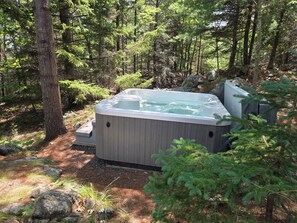The hot tub is the perfect place to relax after a hike, or on cool nights!