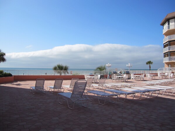 View of Gulf of Mexico and pool deck from condo patio. 