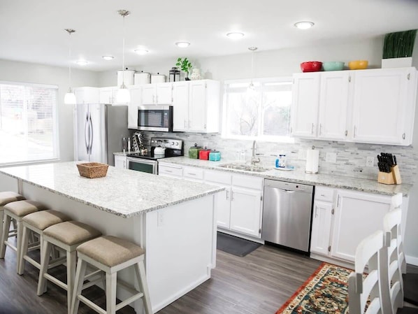 Completely remodeled kitchen with granite counters and stainless appliances