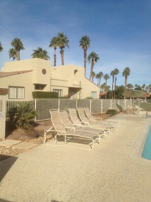 condo is right next to 1 of the community pools