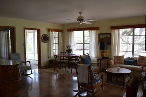 Living area opening onto porch 1 
