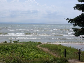 Your private beachfront with dramatic Lake Michigan.