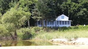 The Seagull Lodge nestled in the trees with the creek to the south.