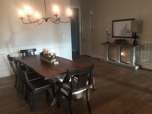 Dining room for 8, is open to main living and kitchen.