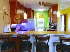 Kitchen made for Rum Punch.  4 stools and counter, but who wants to stay inside?