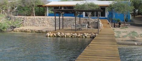 The waterview of the house, standing on the end of the pier.