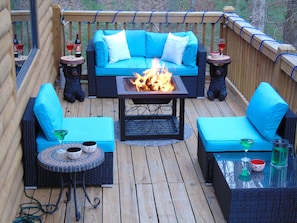 Deck outside of bedroom. Completely fenced in for your dog.