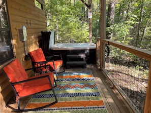 Downstairs Hot Tub, Rocking Chairs, Weber Charcoal Grill, Dining Table & Chairs