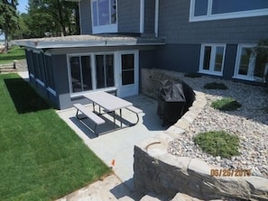 grill and picnic table off lower level porch