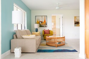 The flow of the open spaces in the condo is inviting & spacious leading to patio
