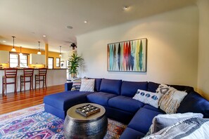Enjoy this lovely sectional couch with friends and family or venture outside to either the front or backyard patios