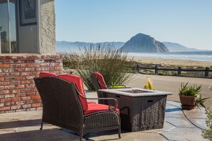 Relax, take in the views and snuggle up by the warm cozy outdoor fire pit. 