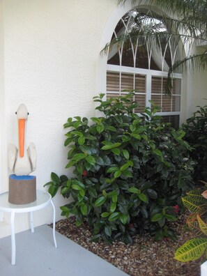 Hand carved pelican welcomes you to a home   with attention paid to every detail